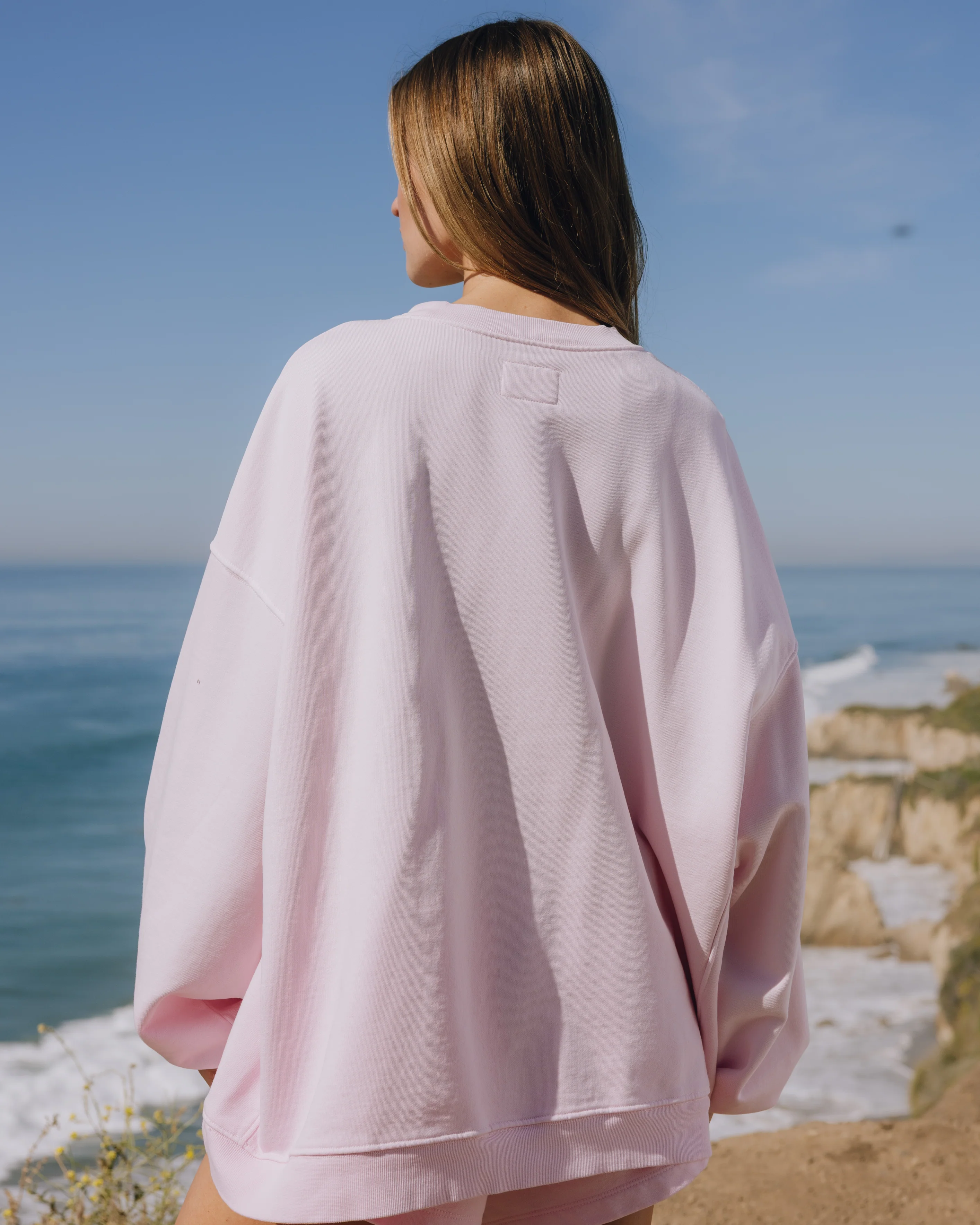 Unisex Oversized Crew - Sunsoaked Cupid with Monochrome Patch - Image 2